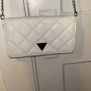 White Guess purse with rosé colored inside